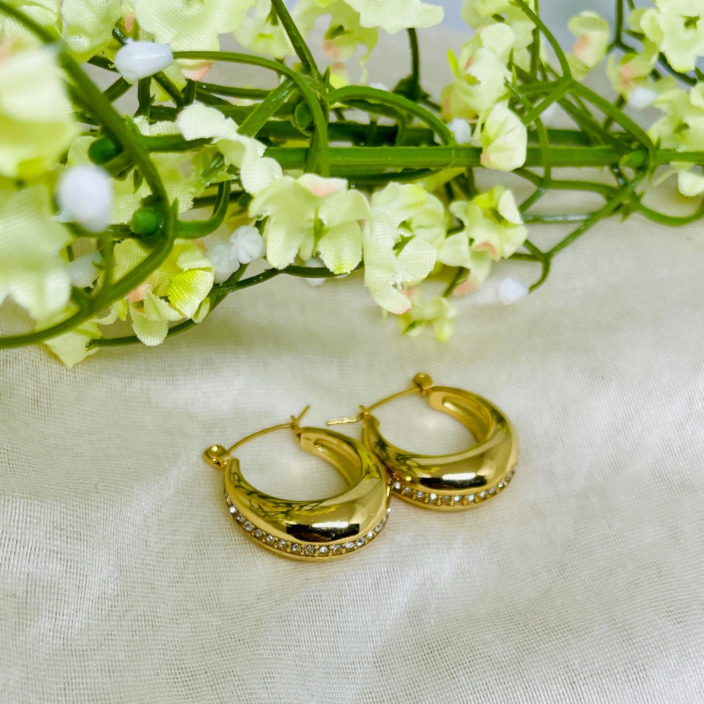 Serene zirconia oval hoop earrings